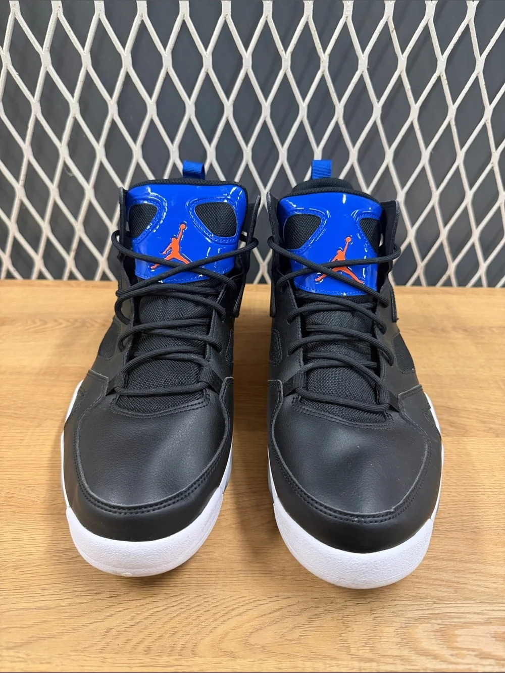 Jordan High-Top Sneakers in Black with Blue and Red Accents